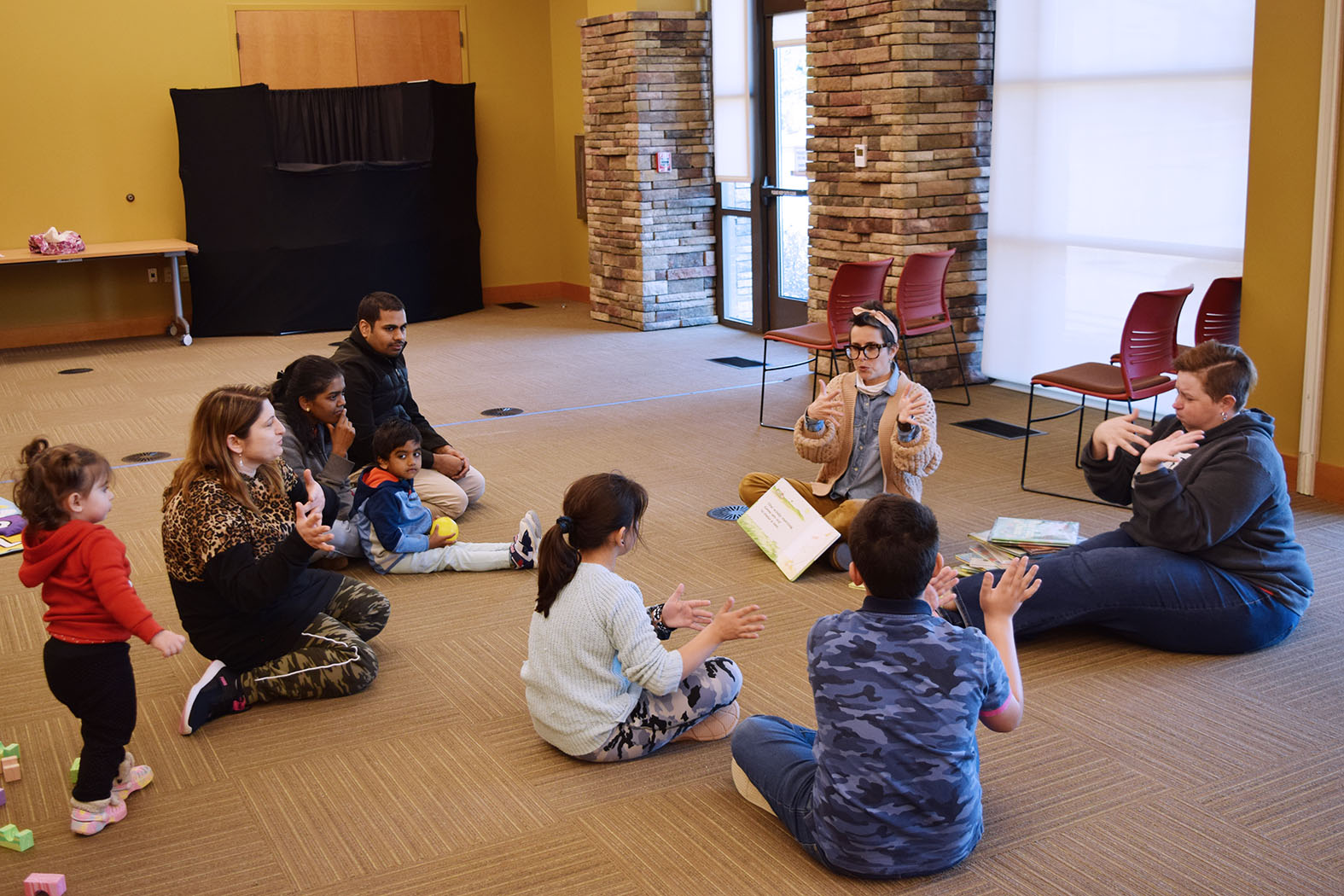 A librarian leads ASL storytime